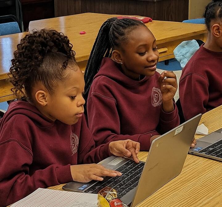 Tutor helping student practice addition, subtraction, multiplication, and division in arithmetic tutoring session